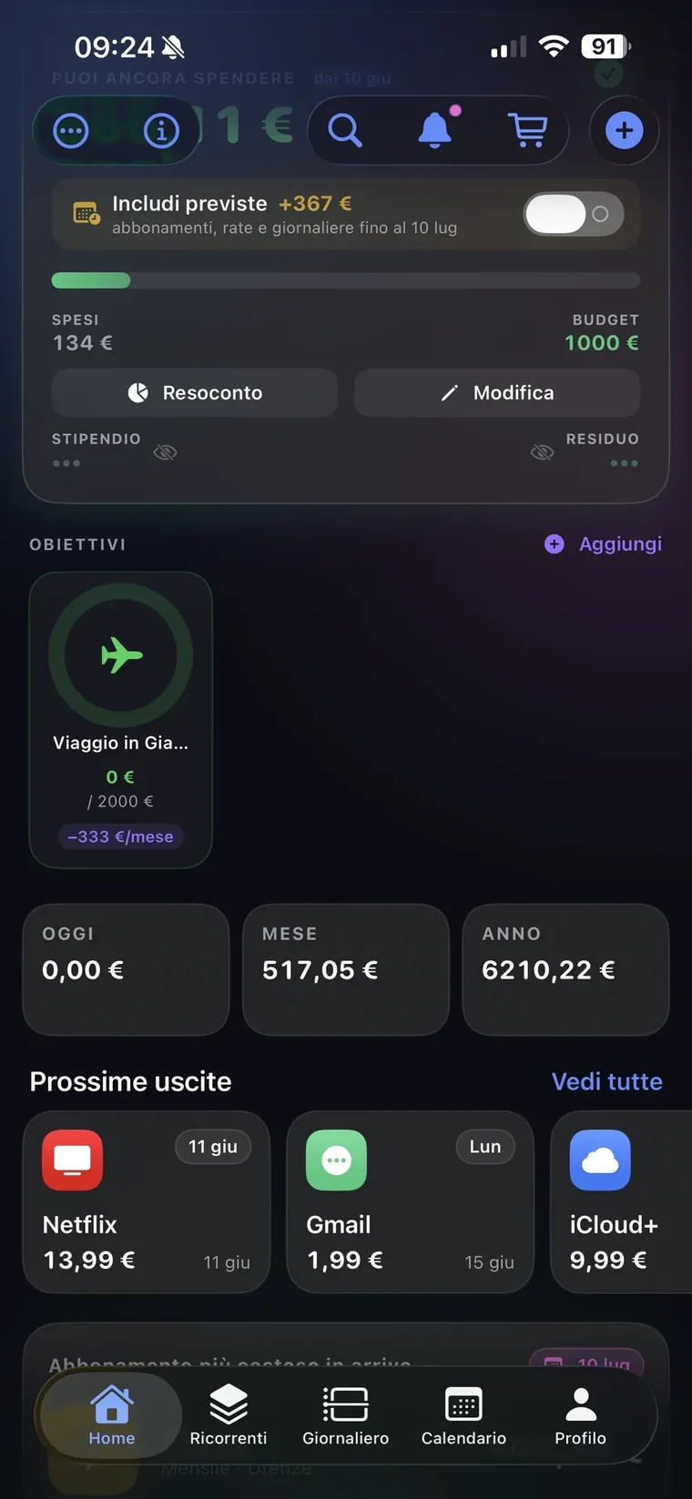 Home di QuantoSpendo con la sezione Obiettivi e l'obiettivo Viaggio in Giappone a 0 su 2000 euro con l'accantonamento mensile stimato, i riquadri Oggi Mese Anno e le Prossime uscite Netflix, Gmail e iCloud+